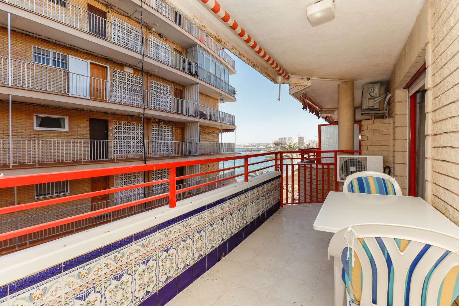 DISCOVER BEACHFRONT LUXURY: 3-BEDROOM APARTMENT ON THE BEACHFRONT OF PLAYA DEL CURA WITH TERRACE, GARAGE AND POOL