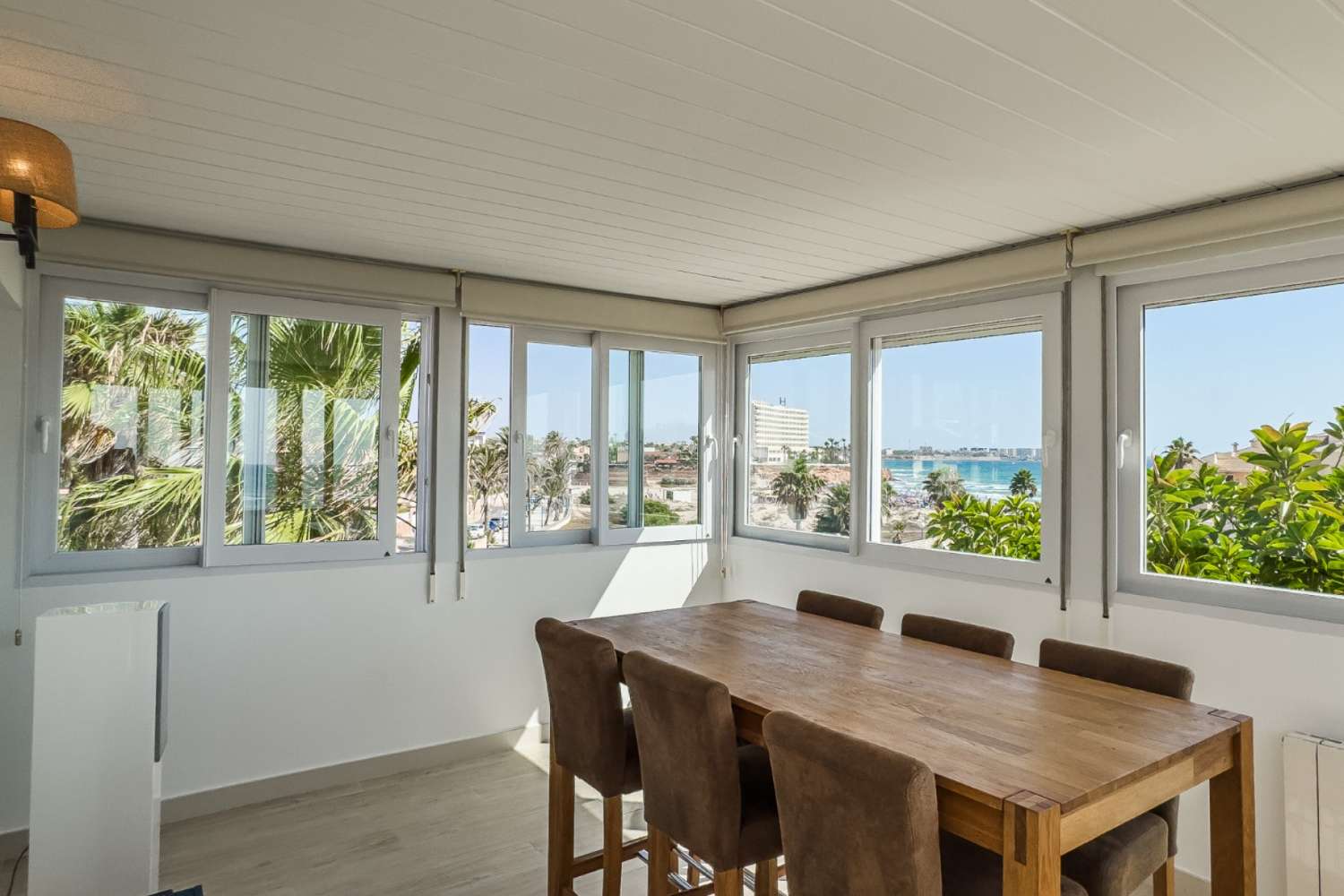 MODERN TRIPLEX BY THE SEA WITH PANORAMIC VIEWS AND TOURIST LICENSE IN LA ZENIA