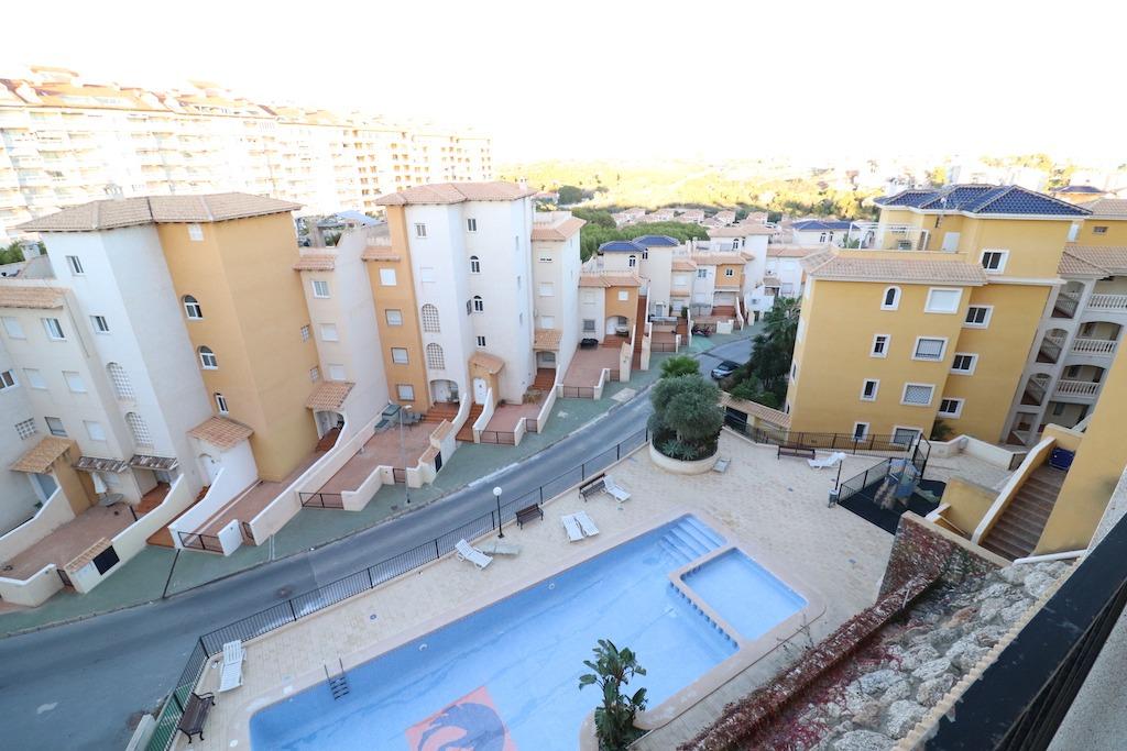 EKSKLUSIV PENTHOUSE I CAMPOAMOR MED HAVUDSIGT, SOLARIUM OG FÆLLES POOL