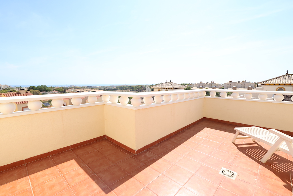 SOUTH FACING CORNER TOWNHOUSE WITH SEA VIEWS AND LARGE PLOT IN LOMAS DE CABO ROIG