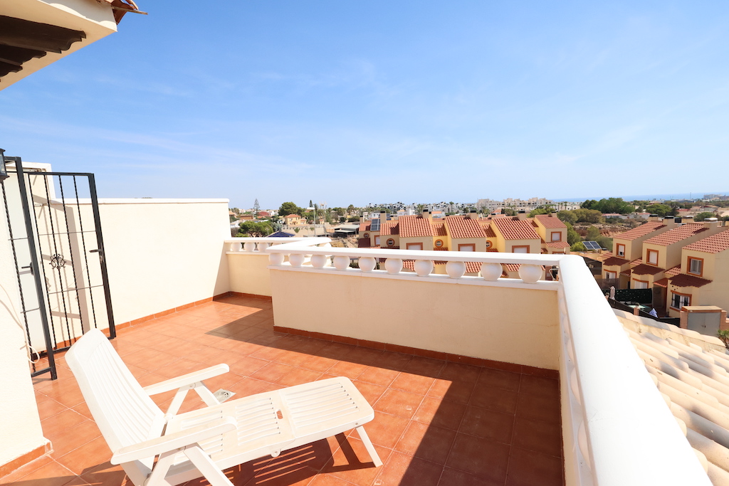 SOUTH FACING CORNER TOWNHOUSE WITH SEA VIEWS AND LARGE PLOT IN LOMAS DE CABO ROIG