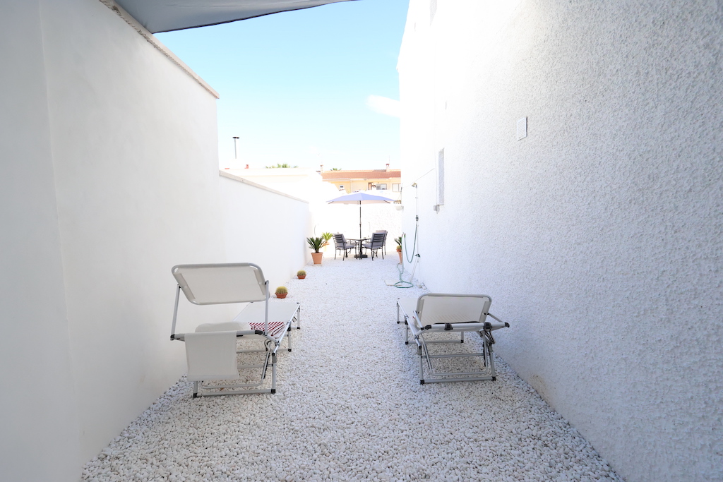 TOP FLOOR BUNGALOW IN LA ROSALEDA WITH GARDEN, SEA VIEWS AND 300 METERS FROM THE BEACH