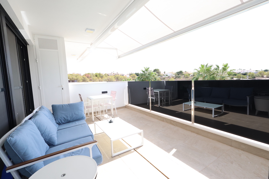 MODERN APARTMENT IN EXCLUSIVE RESIDENTIAL AMANECER 3 WITH LARGE TERRACE AND TWO PARKING SPACES