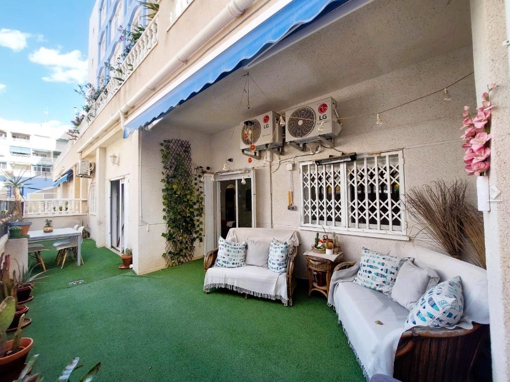 SPECTACULAR GROUND FLOOR APARTMENT WITH TERRACE AND GARAGE FACING THE SEA IN PLAYA DE LOS LOCOS