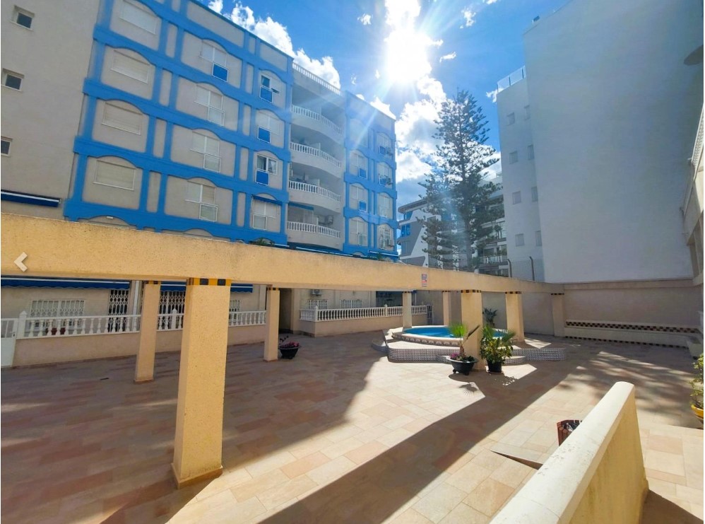 SPECTACULAR GROUND FLOOR APARTMENT WITH TERRACE AND GARAGE FACING THE SEA IN PLAYA DE LOS LOCOS