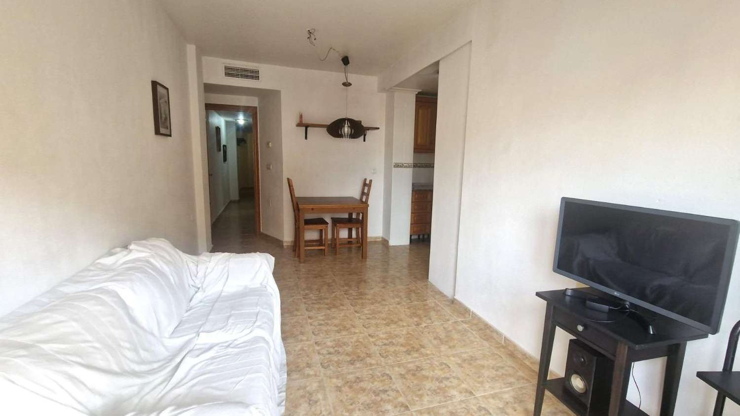 APARTAMENTO A PASOS DEL MAR CON TERRAZA Y VISTA LATERAL A LA PLAYA